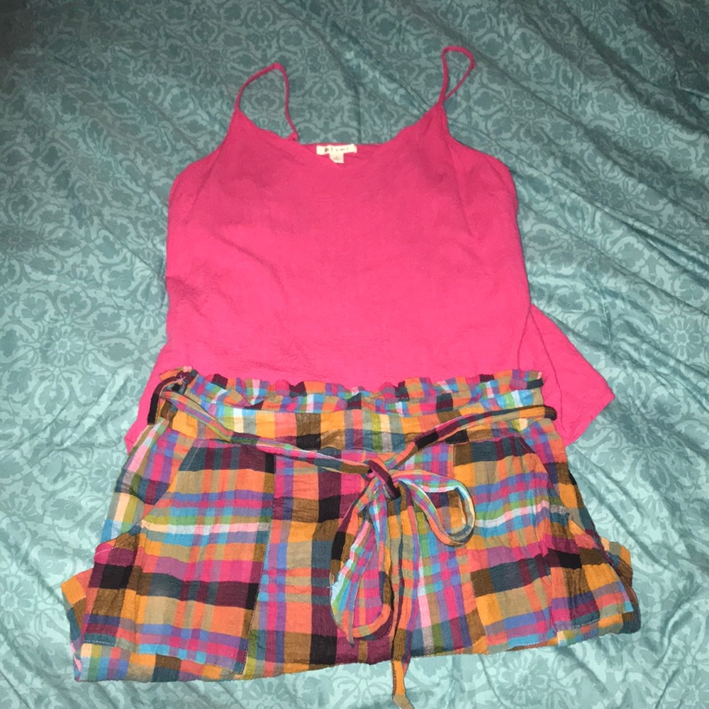 Hot pink tank top with plad rainbow shorts